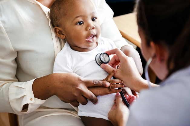 A baby and a doctor